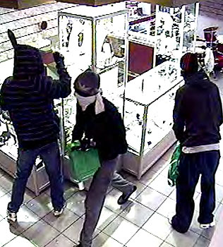 263134-armed-men-ransack-second-hand-shop.jpg