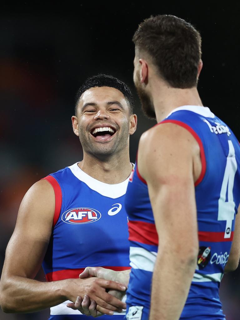 Jason Johannisen and Marcus Bontempelli after the Bulldogs’ win over GWS.