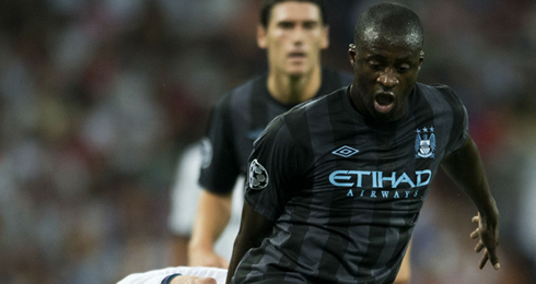 cristiano-ronaldo-559-yaya-toure-playing-with-the-new-manchester-city-black-jersey-kit-uniform-against-real-madrid-in-2012-2013.jpg