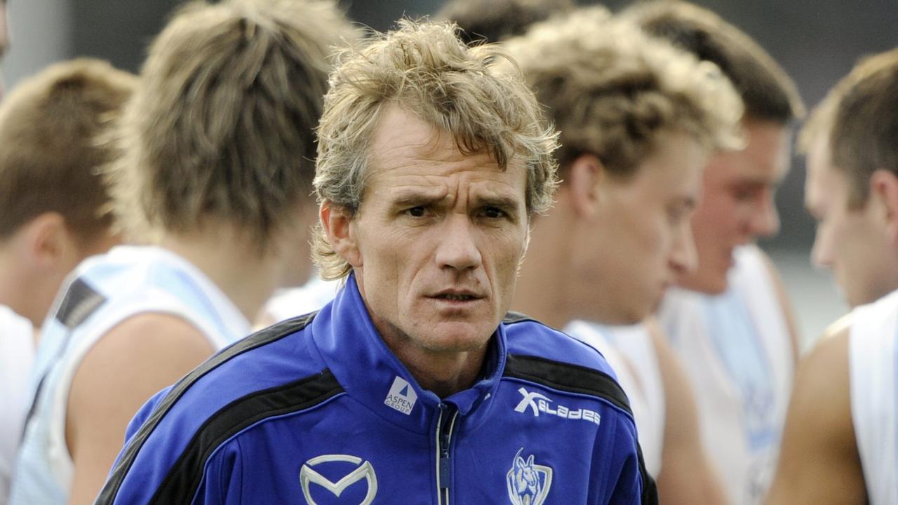 Police officers circulated photos of the former North Melbourne coach.