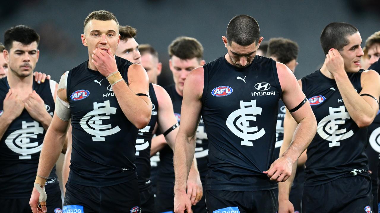 Carlton captain [PLAYERCARD]Patrick Cripps[/PLAYERCARD], left, is in a serious form slump. Picture: Quinn Rooney/Getty Images