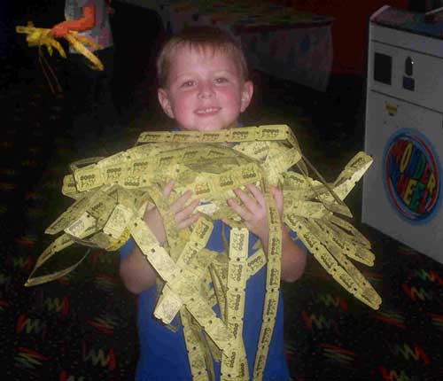 Arcade%20Kid%20w%20Tickets.jpg