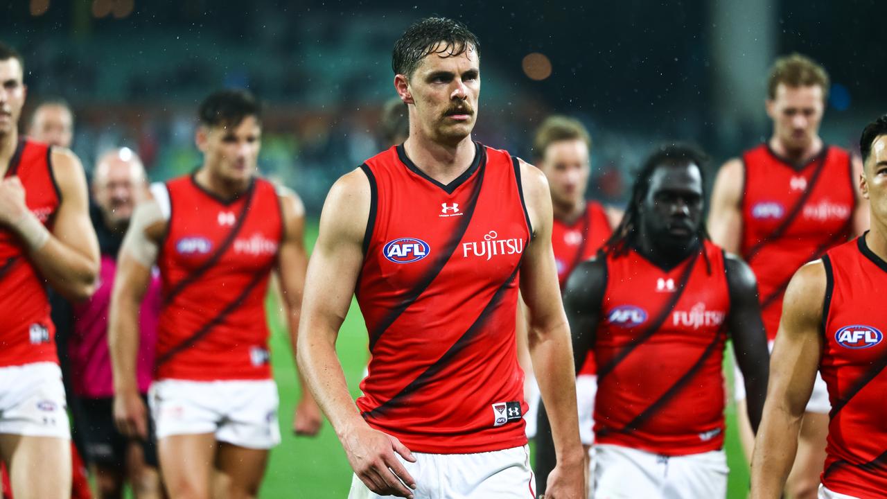 Daniher leads the Bombers off the ground after a loss to Port Adelaide last season. Picture: Getty Images