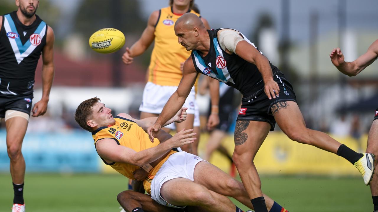 Sam Powell-Pepper crashes into Mark Keane. Picture: Mark Brake/Getty Images