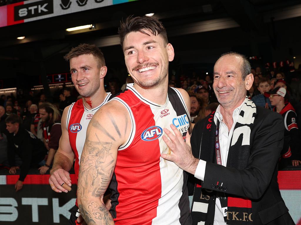 MELBOURNE, AUSTRALIA – JULY 07: Andrew Bassat, President of St Kilda Football Club celebrates with [PLAYERCARD]Josh Battle[/PLAYERCARD] of the Saints during the round 17 AFL match between St Kilda Saints and Sydney Swans at Marvel Stadium, on July 07, 2024, in Melbourne, Australia. (Photo by Kelly Defina/Getty Images)
