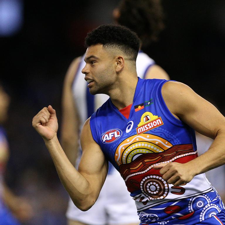 Jason Johannisen celebrates a goal against North Melbourne.