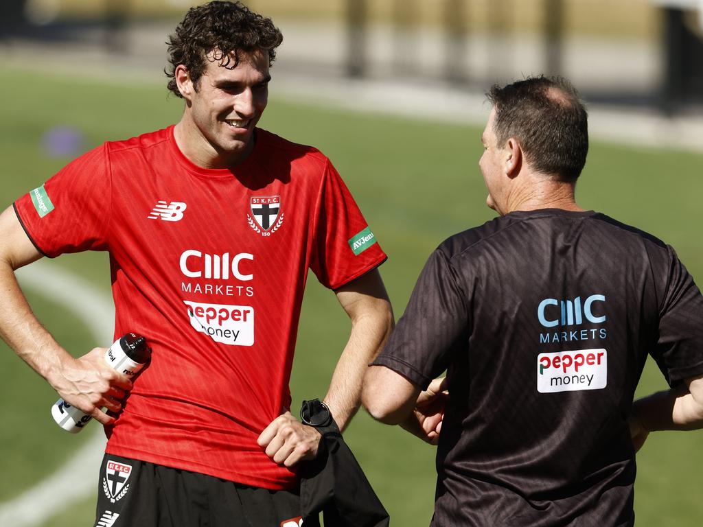 (L-R) [PLAYERCARD]Max King[/PLAYERCARD] of the Saints speaks with Ross Lyon. Picture: Darrian Traynor/Getty Images